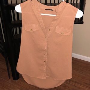 Camel colored top with gold decals